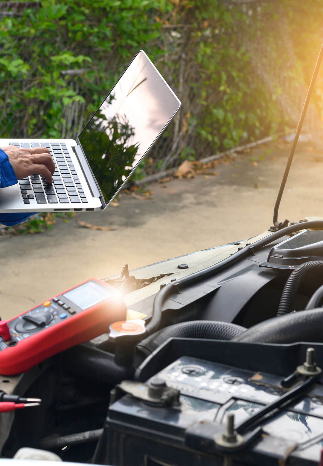 The Auto Repair Technician Is Investigating And Analyzing Car Pr